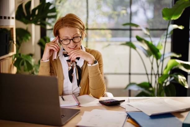 Small business owner planning taxes at a desk